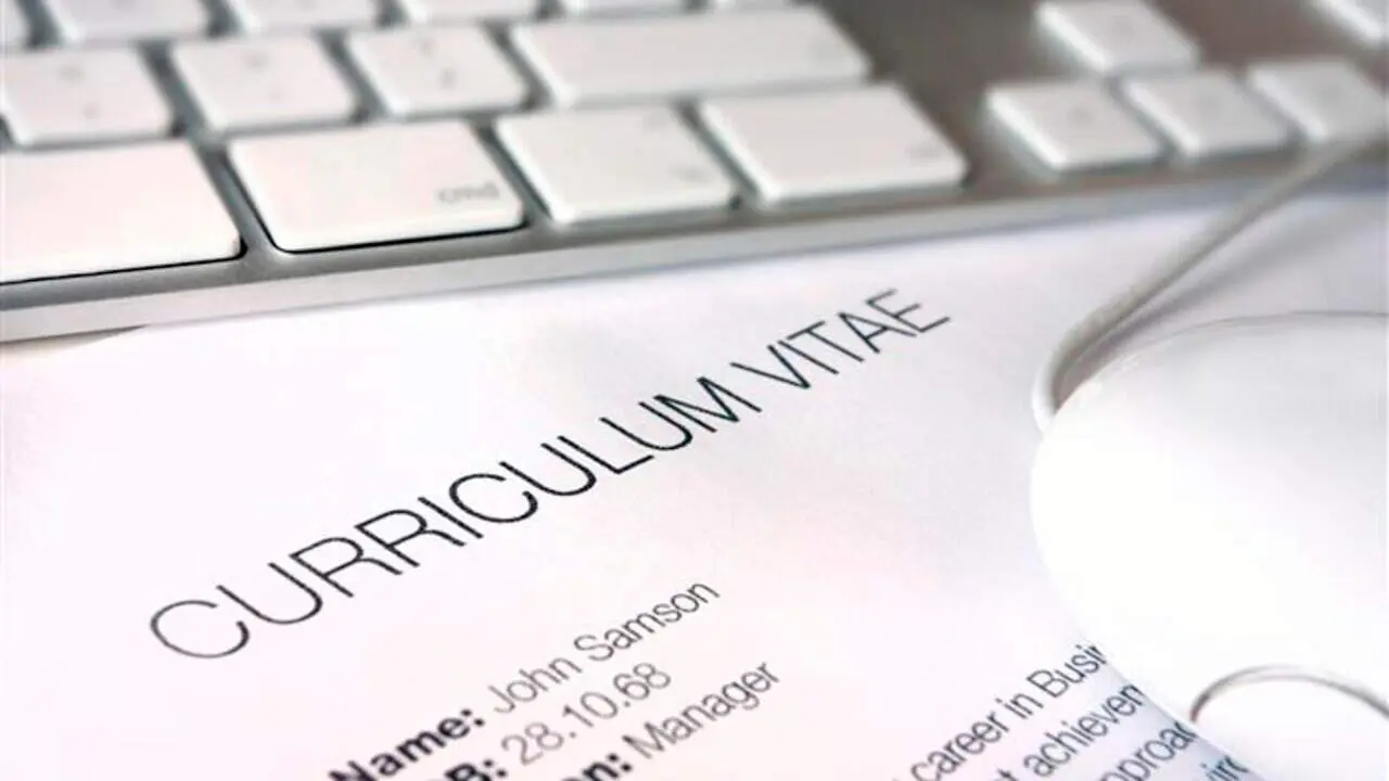 close up of a cv document with keyboard