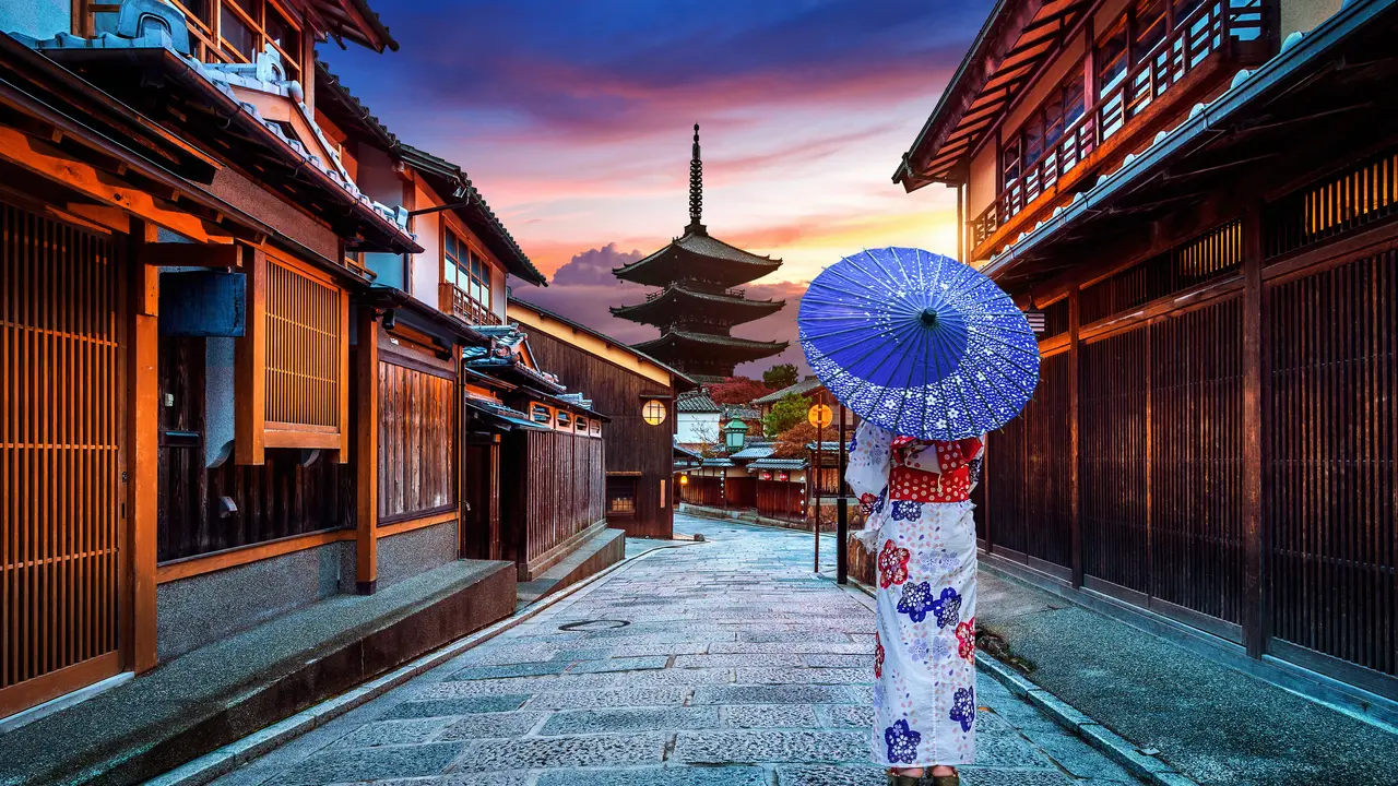 Asian woman wearing japanese traditional kimono at Yasaka Pagoda and Sannen Zaka Street in Kyoto, Japan.