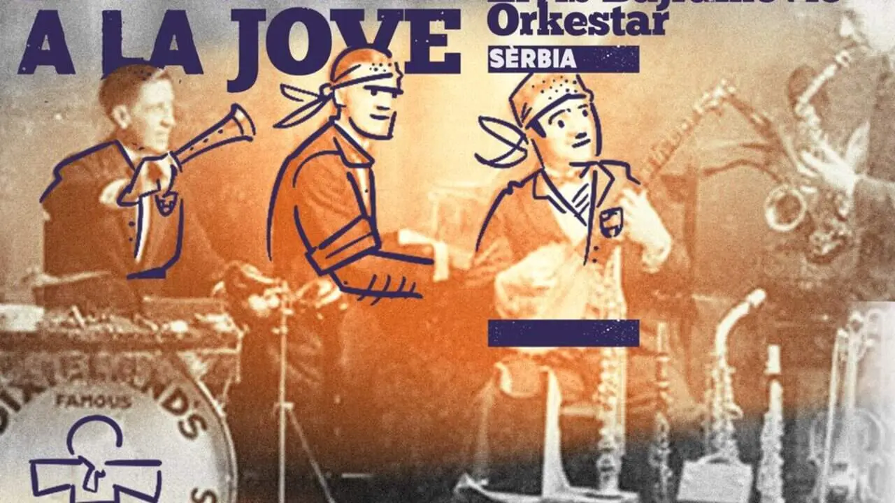 Escenari vibrant de Les Nits del Dixie a Tarragona amb m&uacute;sics tocant en viu sota el cel nocturn