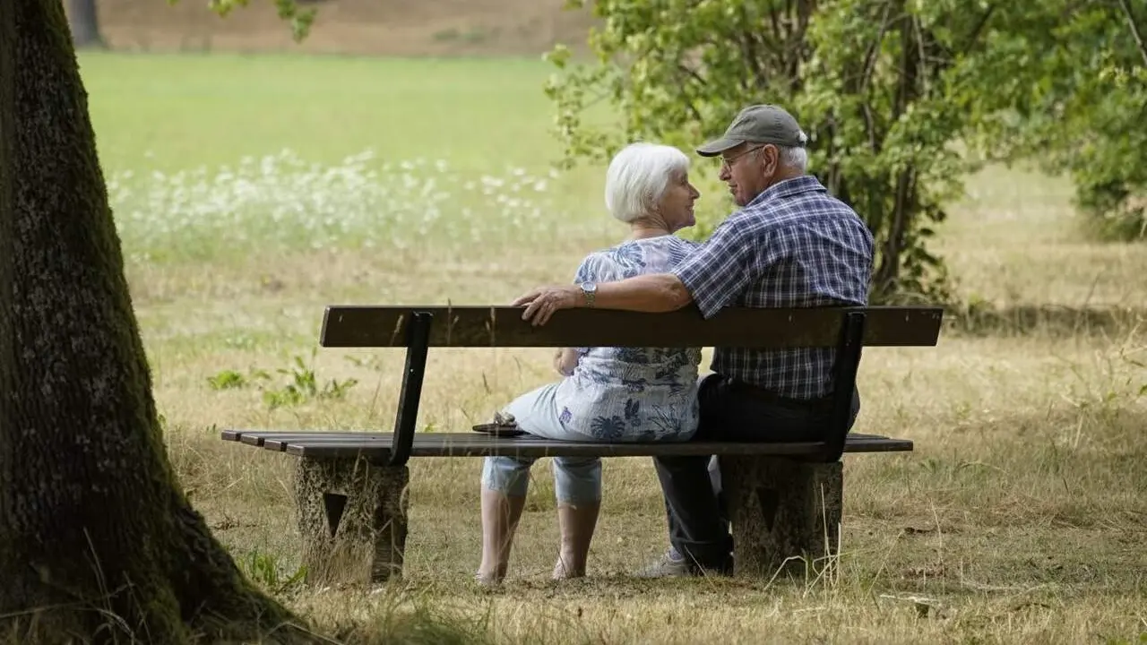 Edifici de pensions i jubilaci&oacute; amb rellotge simbolitzant canvis en l'edat de retirada i ajustos econ&ograve;mics &mdash; Imagen generada por IA